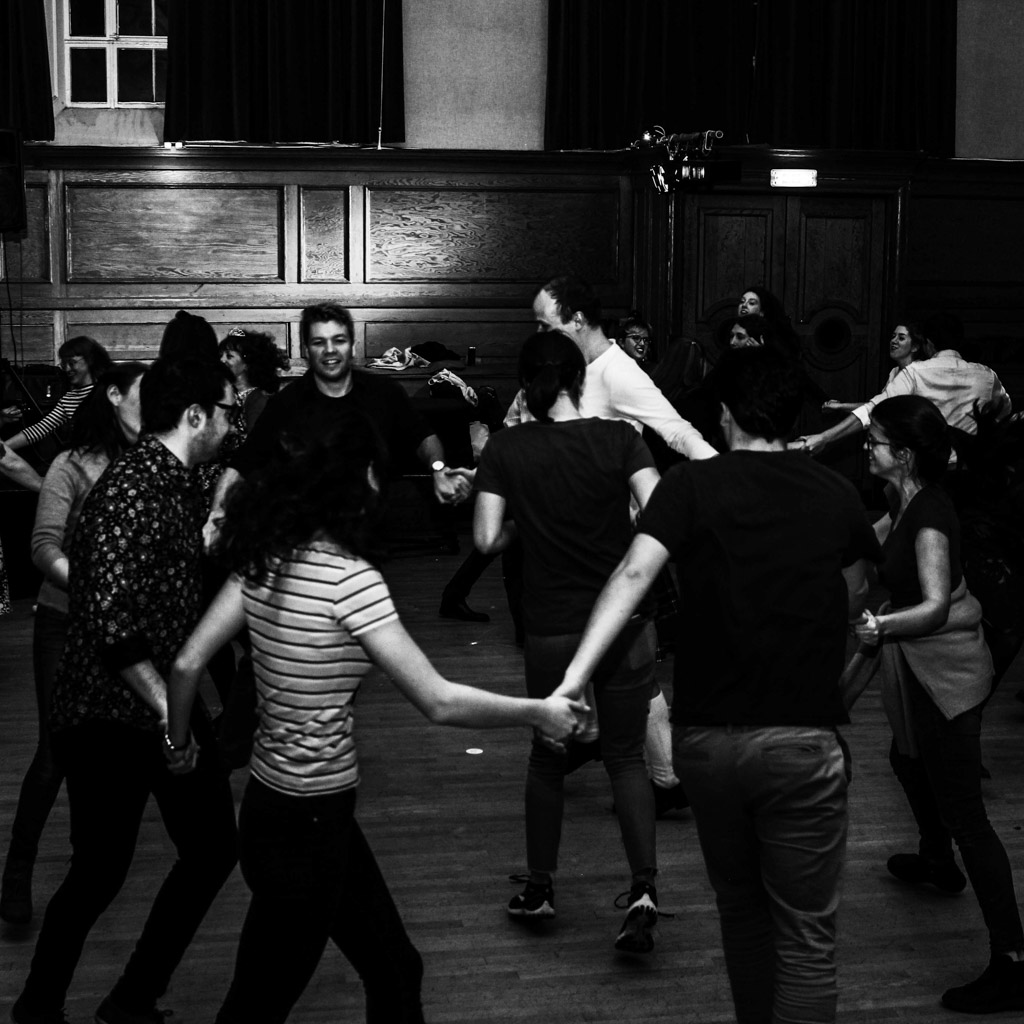 How to Ceilidh Dance - a picture of people ceilidh dancing
